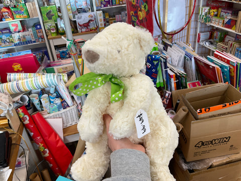 Teddy with a green bow